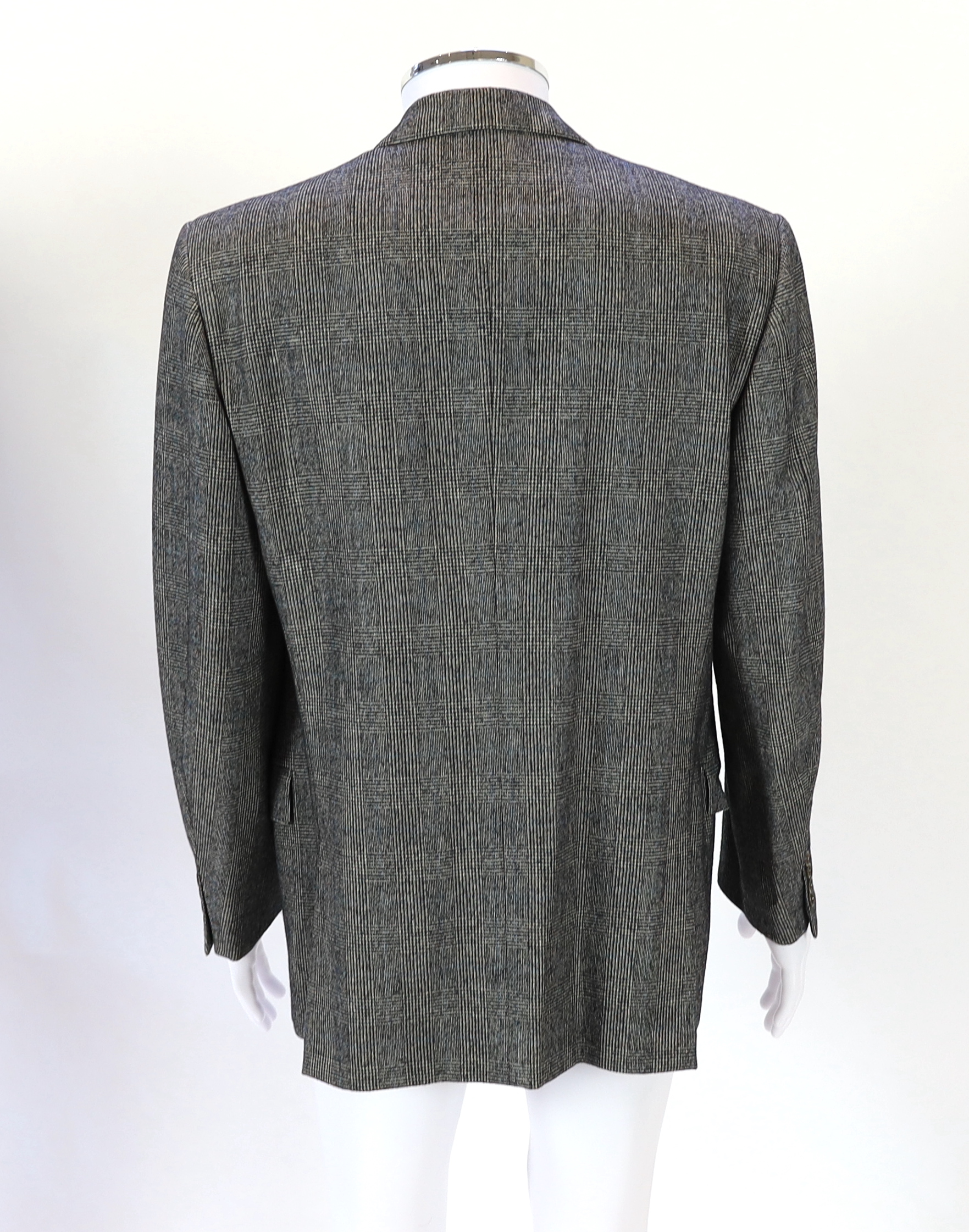 A Yves Saint Laurent rive gauche gentlemen's Prince of Wales check double breasted wool suit, approx size 42